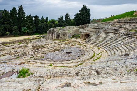 Ancient Greek amphitheater in historic city Syracuse on the island of Sicily, Italyの写真素材