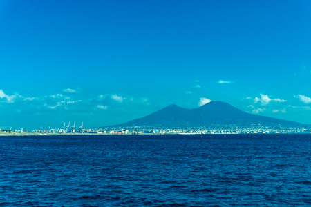 Landscape of Naples with the Vesuvio mountain from the blue mediterranean sea, Italyの写真素材