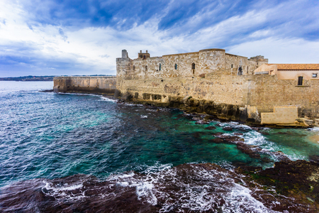 Coast line of Ortigia island at city of Syracuse in Sicily, Italyの写真素材