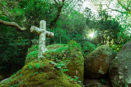 Ancient stone cross, Convent of the Capuchos near Sintra, Lisbon Region, Portugalの写真素材