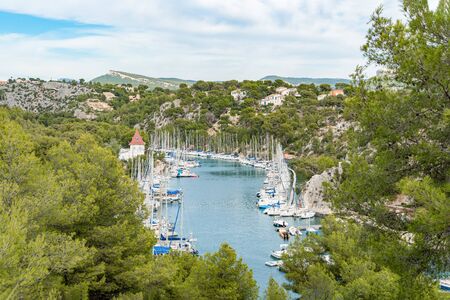 White sailing yacht in the sea fjord. National park of Calanques in Provence. The picturesque gulf...