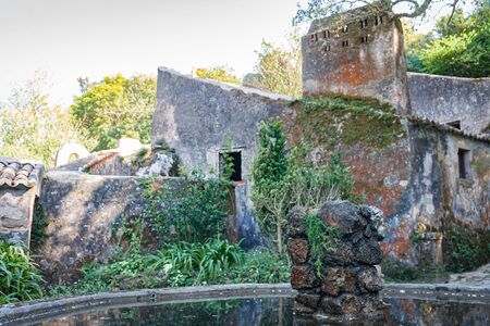 Ancient rocks of fountain, stone building. Convent of the Capuchos, Sintra, Lisbon Region, Portugalの写真素材