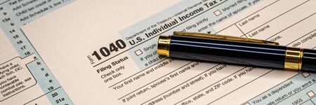 Tax forms 1040. U.S Individual Income Tax Return. Tax time. Wide banner