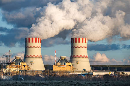 Nuclear power plant, Cooling tower of Atomic power station. Industrial zone with emission of steam...