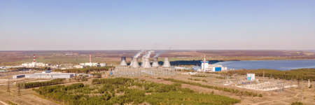 Nuclear power plant production clean energy from source renewable energy. Industrial zone with power station atomic energy production. Wide bannerの写真素材