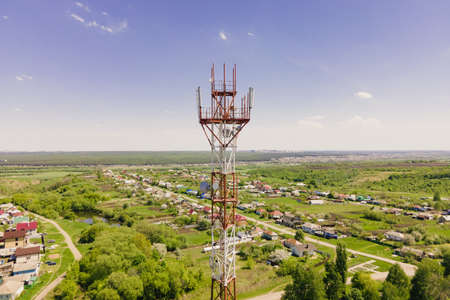 Telecom tower witn 4G network, telecomunication base station. 5G antenna witn 5G technology in rural countrysideの写真素材
