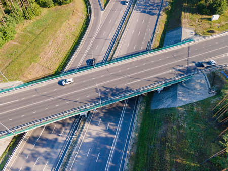 Road junction intersection with car traffic transportation