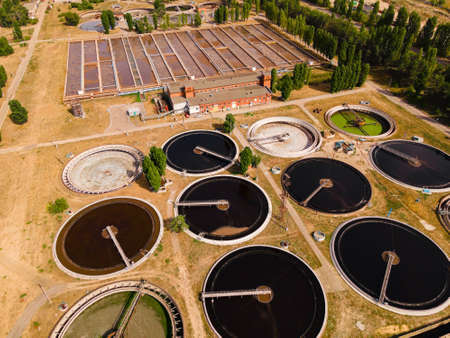 Wastewater treatment plant with round clarifiers for recycle dirty sewage water, aerial view