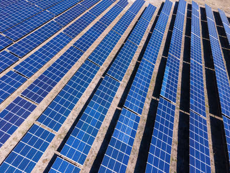 Solar power station with panels standing in rows. Concept of green renewable energy, future...