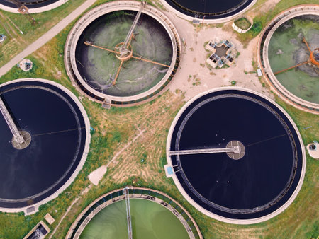 Wastewater treatment plant with round ponds for recycle dirty sewage water, aerial viewの写真素材