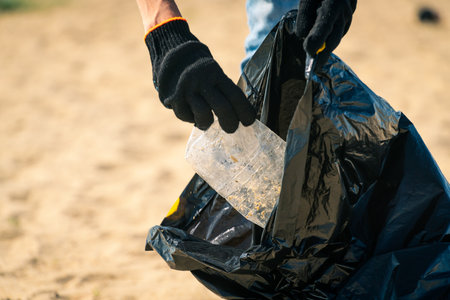 Collect plastic garbage in bags, clean up plastic bottles. environmental problemsの写真素材
