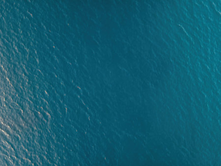 Ocean surface aerial view, sea water texture background top down viewの写真素材