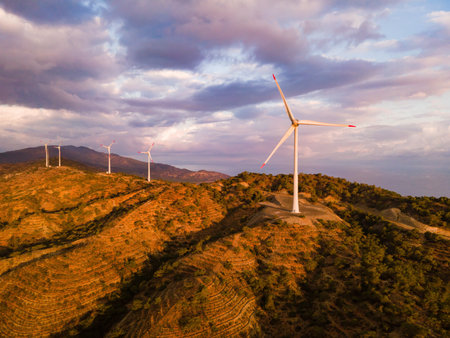Aerial view of wind turbines farm in sunset time. alternative green energyの写真素材