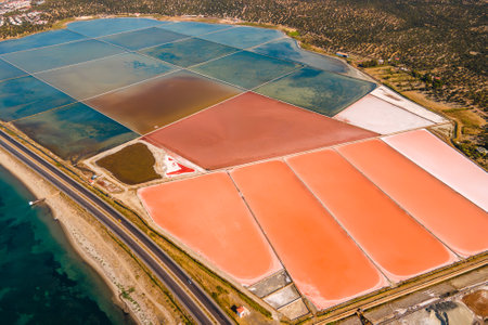Aerial drone view of the evaporation salt pans in saltworks in Turkiye. Salt fields. Stone Salt Worksの写真素材