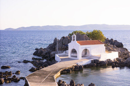 Small chapel in the bay on peninsula on the Greek island Chiosの写真素材