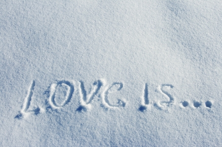 Word love written on fresh snow の写真素材