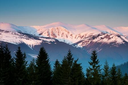 Majestic sunset in the winter mountains landscape. HDR imageの写真素材