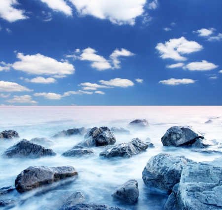 Beautiful sea and clouds sky with sunの写真素材