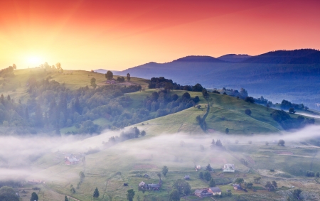 Beautiful summer landscape in the mountain village. Dramatic sky. Carpathian, Ukraine, Europe. Beauty world.の写真素材