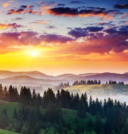 Majestic sunset in the mountains landscape. Dramatic sky. Carpathian, Ukraine, Europe. Beauty world.の写真素材