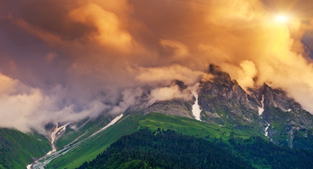 Majestic colorful sunset at the foot of  Mt. Ushba. Upper Svaneti, Georgia, Europe. Caucasus mountains. Beauty world.の写真素材