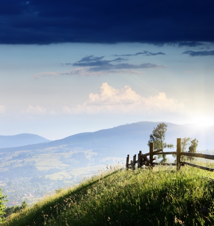Majestic sunset in the mountains landscape. Overcast sky before storm. Carpathian, Ukraine, Europe.の写真素材
