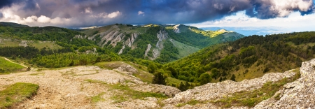 Beautiful view of rural alpine landscape. Overcast sky before storm. Crimea, Ukraine, Europe. Beauty world.の写真素材