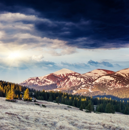 Majestic sunset in the mountains landscape. Dramatic sky. Carpathian, Ukraine, Europe.の写真素材