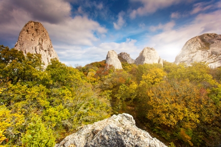 Majestic morning mountain landscape with colorful forest. Autumn leaves. Crimea, Ukraine, Europe. Beauty world.の写真素材