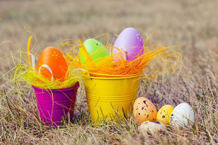 Colorful Easter eggs decorated in the grass