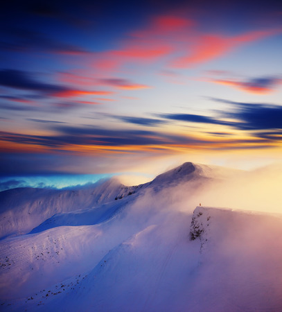 Majestic sunset in the winter mountains landscape. HDR imageの写真素材
