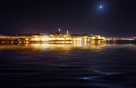 Night view of Valletta from Sliema. Valletta with Our Ladyの写真素材