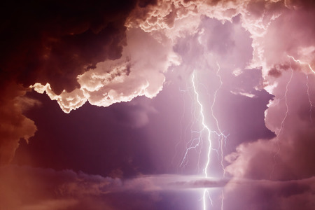 Dark ominous clouds. Thunderstorm with lightning.