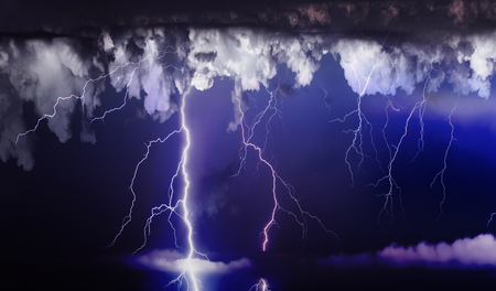 Dark ominous clouds. Thunderstorm with lightning.