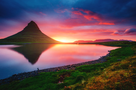 Fantastic evening with Kirkjufell volcano the coast of Snaefellsnes peninsula. Popular tourist attraction. Dramatic and picturesque scene. Location place Kirkjufellsfoss, Iceland, Europe. Beauty worldの写真素材