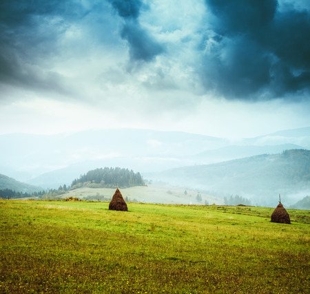 Great view of the green hills which glowing by sunlight. Dramatic scene and picturesque picture. Location place Swiss alps, Europe. Beauty world. Retro and vintage styleの写真素材