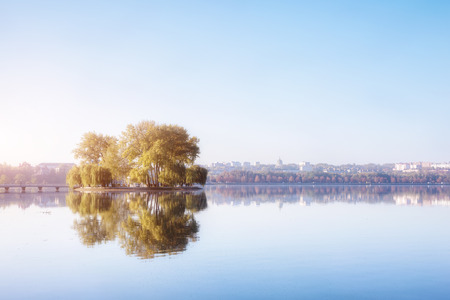 Vivid view of the foggy pond in morning. Dramatic and gorgeous scene. Location place Ternopil, Ukraine, Europe. Discover the world of beauty. Glowing filter. Artistic picture. Vintage effect.の写真素材
