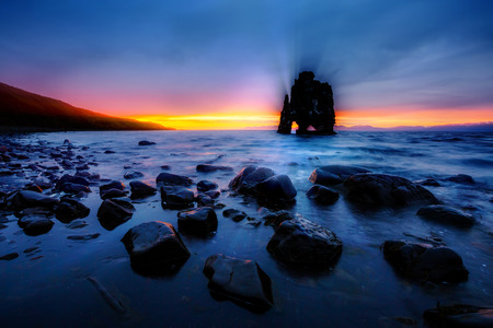 Wonderful dark stones after the tide. Dramatic and gorgeous scene. Location place Hvitserkur, Vatnsnes peninsula, island Iceland, Europe. Popular tourist attraction. Discover the world of beauty.の写真素材