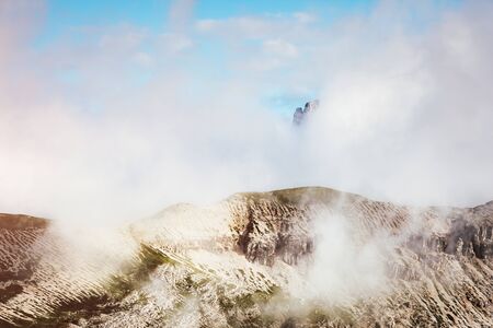 Foggy hill and magical scene of the alpine valley. Location Dolomiti, South Tyrol, Dramatic day and picturesque image. Ecology concept - climate change in the environment. Explore the world's beauty.の写真素材