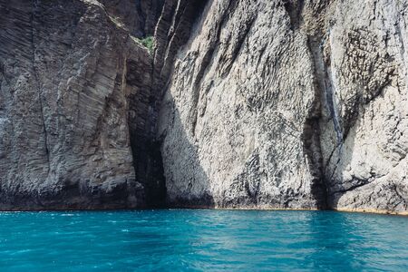 Karadag mountain range in Crimean peninsula, an ancient extinct volcano. Location Kara Dag (Black Mount), coastal town of Koktebel. Unique place on earth. Explore the world's beauty and wildlife.の写真素材