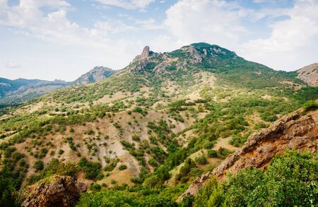 Karadag mountain range in Crimean peninsula, an ancient extinct volcano. Location Kara Dag (Black...