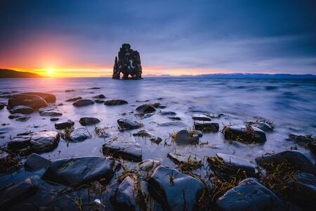 Magical dark stones after the tide. Location place famous Hvitserkur, Vatnsnes peninsula, Iceland, Europe. Exotic scene. Scenic image of most popular tourist attraction. Discover the beauty of earth.の写真素材