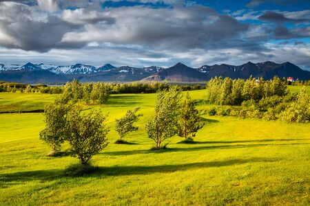 Splendid Iceland landscape with golf course in sunny day. Location place Borgarnes, western Iceland, Europe. Scenic image of beautiful nature landscape. Holiday season. Discover the beauty of earth.の写真素材