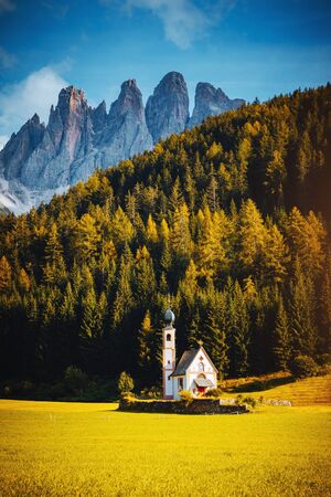 Awesome view San Giovanni Church in St. Magdalena village. Location place is the landmark Val di Funes (Villnob), Dolomite alps, Trentino-Alto Adige, Italy, Europe. Discover the beauty of earth.の写真素材