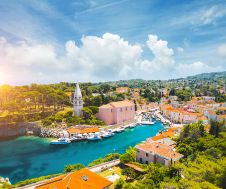 Scenic view of the lagoon village Veli Losinj on sunny day. Location place Kvarner Gulf, island Losinj, Croatia, Europe. Drone photography. Summer vacation concept. Discover the beauty of earth.