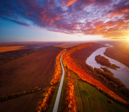 Winding canyon of the Dniester River from a bird's eye view. Location place Dnister canyon of Ukraine, Europe. Aerial photography, drone shot. Photo wallpaper. Discover the beauty of earth.の写真素材