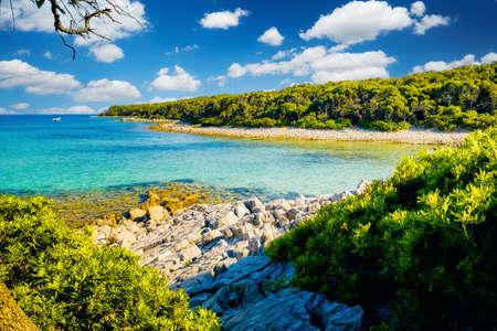 Awesome wild beach with azure water in luxurious lagoon on sunny day. Location place Punta Kriza, Cres island, Kvarner bay, Croatia, Europe. Exotic photo wallpapers. Discover the beauty of earth.の写真素材