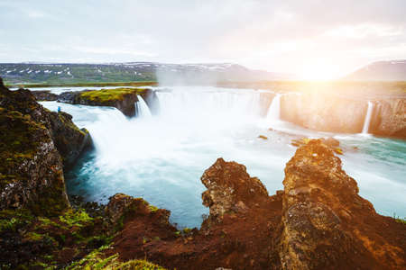 Amazing view of famous Godafoss cascade. Location place Bardardalur valley, Skjalfandafljot river, Iceland, Europe. Scenic image of most popular tourist attraction. Discover the beauty of earth.の写真素材