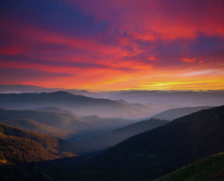 Picturesque evening landscape illuminated by the sunset. Location place of Carpathian mountains,...