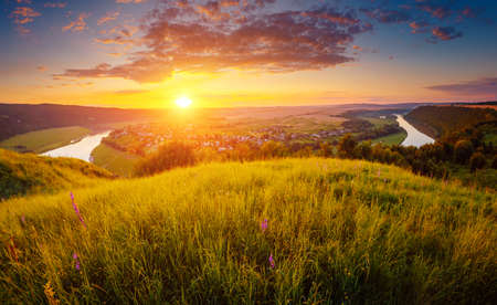Fresh summer view of the sinuous Dniestr river in sundown. Location place Dnister river of Ukraine, Europe. Vibrant photo wallpaper. Exotic nature photography. Discover the beauty of earth.の写真素材